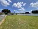 Large backyard with fence and lush grass at 14 Morton Rd, Winter Haven, FL 33881