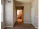 Hallway showing the layout of the home with a doorway into a bathroom and bedrooms at 14 Morton Rd, Winter Haven, FL 33881