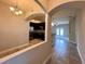 Inviting kitchen featuring granite countertops and stainless steel appliances, seamlessly flowing into the living area at 14 Morton Rd, Winter Haven, FL 33881