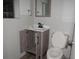Bathroom featuring a new vanity and fixtures, and a standard toilet at 1440 Hackl Blvd, Bartow, FL 33830