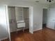 Bedroom with built-in closet shelving and drawers for organized storage at 1440 Hackl Blvd, Bartow, FL 33830