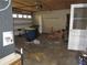 This spacious garage features an automatic door, utility sink, and room for parking at 1440 Hackl Blvd, Bartow, FL 33830