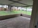 Covered patio enclosed by screens, offering a relaxing outdoor living space at 1440 Hackl Blvd, Bartow, FL 33830