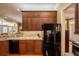 Well-designed kitchen with granite countertops, stainless steel appliances, and lots of storage space at 1589 Royal Forest Ct, Lakeland, FL 33811