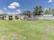 Large backyard with in-ground pool, shed, and expansive green lawn for outdoor activities at 1685 Kissengen Ave, Bartow, FL 33830