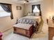 Well-lit bedroom with stylish furnishings, natural light and neutral carpeting at 1685 Kissengen Ave, Bartow, FL 33830