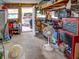 Garage with tools, workbench, and storage solutions, providing organized space for projects and vehicles at 1685 Kissengen Ave, Bartow, FL 33830