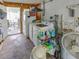 Functional laundry room with appliances, storage, and outdoor access for convenience at 1685 Kissengen Ave, Bartow, FL 33830