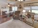 Open living area with dining space, comfortable seating and bright neutral tones at 1685 Kissengen Ave, Bartow, FL 33830