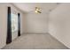 Bright bedroom with carpet, ceiling fan, natural light, and neutral paint at 1975 Country Manor St, Bartow, FL 33830