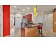 Modern kitchen featuring stylish bar counter, stainless steel appliances, and an open layout at 1975 Country Manor St, Bartow, FL 33830