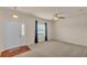 Bright living room with carpet, ceiling fan, natural light, and neutral paint at 1975 Country Manor St, Bartow, FL 33830