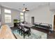 Entertaining bonus room has media center, game tables, and hardwood floor at 228 Magneta Loop, Auburndale, FL 33823