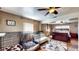 This bedroom provides multiple closets, a ceiling fan, and an attached bonus room with natural light at 2333 Cheshire Pl, Lakeland, FL 33810