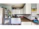 Another angle of the kitchen, displaying ample cabinet space and modern countertop design at 2333 Cheshire Pl, Lakeland, FL 33810