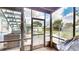The home has a screened in patio with access to the backyard at 2333 Cheshire Pl, Lakeland, FL 33810