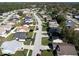 Aerial view of houses and neighborhood, with a view of the street at 244 Kings Pond Ave, Winter Haven, FL 33880