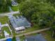 An aerial view of a home showing a screen porch and fencing at 257 Padgett N Pl, Lakeland, FL 33809