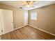 This bedroom features a ceiling fan and vinyl floors at 2655 Hempstead Dr, Lakeland, FL 33801