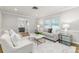 Comfortable living room featuring neutral tones, plush seating, and elegant decor for relaxed living at 2726 Cleveland Heights Blvd, Lakeland, FL 33803