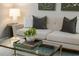Bright and cozy living room featuring stylish decor, and a modern coffee table at 2726 Cleveland Heights Blvd, Lakeland, FL 33803