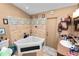 Bathroom featuring a corner bathtub, neutral tile, and modern fixtures, all bathed in warm lighting at 330 Diesel Rd, Mulberry, FL 33860