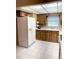 Functional kitchen featuring wood cabinetry and a white refrigerator at 3315 Cross Fox Dr, Mulberry, FL 33860