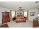 Elegant main bedroom with a ceiling fan, carpeted floors, and windows offering lots of natural light at 3315 Cross Fox Dr, Mulberry, FL 33860