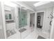 Bright bathroom featuring a glass walk-in shower and luxurious finishes at 3370 Highland Fairways Blvd, Lakeland, FL 33810