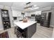 Well-appointed kitchen with a central island, modern appliances, and plenty of counter space at 3370 Highland Fairways Blvd, Lakeland, FL 33810