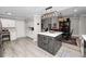 Bright kitchen with an island, ample cabinet space, and an open layout for easy entertaining at 3370 Highland Fairways Blvd, Lakeland, FL 33810
