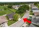 Street view showing the house and surrounding neighborhood with mature trees at 3370 Highland Fairways Blvd, Lakeland, FL 33810