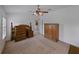 Carpeted bedroom with shuttered windows and good closet space at 3427 Waterlute Way, Lakeland, FL 33811