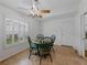 Bright breakfast nook area with lots of natural light, tile flooring, and ceiling fan at 3427 Waterlute Way, Lakeland, FL 33811