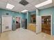 Functional common area with ample storage, modern appliances, and easy access to multiple rooms at 3427 Waterlute Way, Lakeland, FL 33811