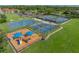 Community offers a playground, tennis courts, and basketball court for outdoor recreation at 3427 Waterlute Way, Lakeland, FL 33811