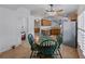 The dining area showcases tile floors, a ceiling fan, and access to other rooms at 3427 Waterlute Way, Lakeland, FL 33811