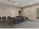 Comfortable game room with ping pong table and large window at 3427 Waterlute Way, Lakeland, FL 33811