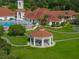Outdoor gazebo in a beautifully landscaped community near a pool, perfect for social gatherings and relaxation at 3427 Waterlute Way, Lakeland, FL 33811