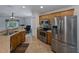 The updated kitchen is equipped with stainless steel appliances and ample counter space at 3427 Waterlute Way, Lakeland, FL 33811