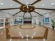Elegant meeting room with hardwood floors, custom wood ceiling and muraled walls, creating a refined space at 3427 Waterlute Way, Lakeland, FL 33811