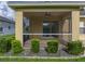 Covered patio offering an ideal outdoor living space and serene views at 3427 Waterlute Way, Lakeland, FL 33811