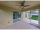 Covered screened-in patio with ceiling fan; great for enjoying the outdoors at 3427 Waterlute Way, Lakeland, FL 33811