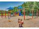 A fun community playground with colorful equipment including slides, swings, and climbing structures at 3427 Waterlute Way, Lakeland, FL 33811