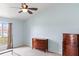 Bright bedroom with a ceiling fan, plush carpet, and a dresser at 367 Cloverdale Rd, Winter Haven, FL 33884