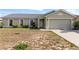Charming single-Gathering home with a two-car garage and green lawn at 367 Cloverdale Rd, Winter Haven, FL 33884