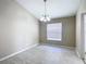Dining room with ceramic floors and window to let in natural light at 3806 Osprey Pointe Cir, Winter Haven, FL 33884
