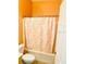 Bathroom featuring a toilet and shower with curtain at 4102 Lake Marion Golf Resort # 4102, Kissimmee, FL 34759