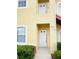 Close-up view of the unit entrance with a white door and visible unit number, 4102 at 4102 Lake Marion Golf Resort # 4102, Kissimmee, FL 34759