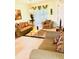 Cozy living room with sofas, armchairs, and a neutral color palette creating a welcoming atmosphere at 4102 Lake Marion Golf Resort # 4102, Kissimmee, FL 34759